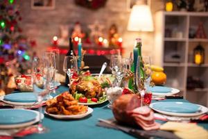 Delicious roasted chicken on the table photo