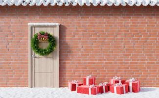 Facade with snow, door and gifts on the ground photo