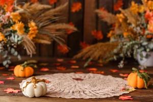 Beautiful autumn photozone with colored leaves and dry flowers photo