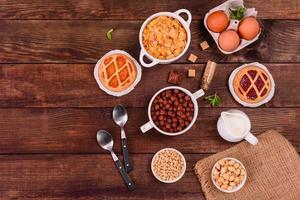 Tasty and nutritious breakfast with granola, cereals and nuts. Healthy food photo