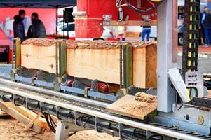 Modern woodworking technology, automatic sawmill, close-up. photo