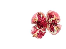 Ripe pomegranate fruit on a white background photo