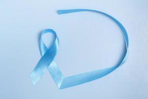 Concept for world diabetes day 14 november. Symbolic bow color raising awareness on diabetes day on light background. Copy space photo