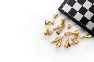 top view chess board game on white table photo