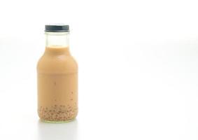 milk tea with pudding jelly in glass bottle photo