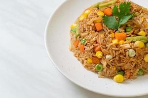 fried rice with green peas, carrot and corn photo