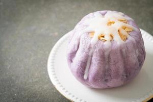 taro bun with white sugar cream and nut photo