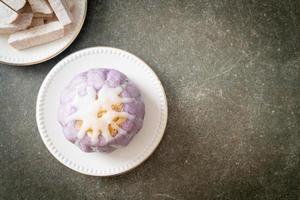 taro bun with white sugar cream and nut photo