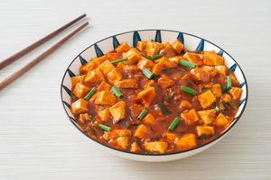 Mapo Tofu - The traditional Sichuan dish of silken tofu and ground beef, packed with mala flavor from chili oil and Sichuan peppercorns.