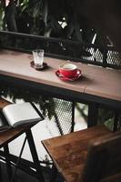 Hot coffee on table with abstract emotion photo