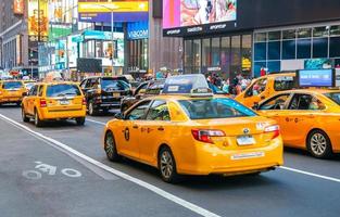 NEW YORK CITY, USA - JUNE 21, 2016. Yellow cabs on the busy traffic of 31st Street of Manhattan