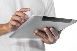 Hand using tablet  touching on screen technology photo