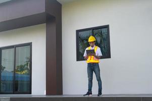 Engineer service on site inspection at home building construction photo