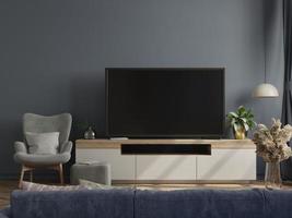 Mockup tv on cabinet in modern empty room with the dark wall. photo