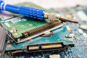 micro circuit main board computer electronic technology, hardware, mobile phone, upgrade, cleaning concept. photo