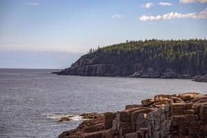 Rocky coastline along the ocean in Maine, United States