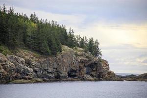 Rocky coastline along the ocean in Maine, United States