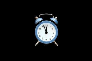 Blue vintage alarm clock shows 12 o'clock isolated on black background. Wake up and hurry up. Hot sale, final price, last chance. Countdown to midnight new year. Copy space for your text photo