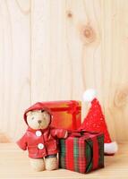 Dolls and gift box decoration for christmas backgrounds vertical side views photo