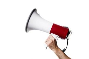 isolated portrait of a hand holding a megaphone photo