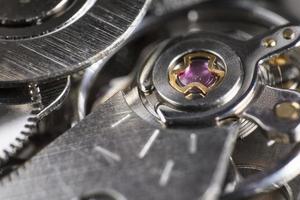 macro detail of ruby in watch mechanism photo