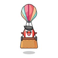 canada flag mascot riding a hot air balloon vector