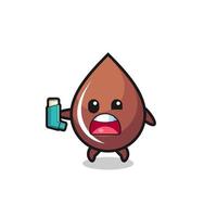 chocolate drop mascot having asthma while holding the inhaler vector