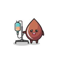 cute chocolate drop character standing with infusion pole vector