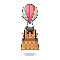 wooden box mascot riding a hot air balloon vector