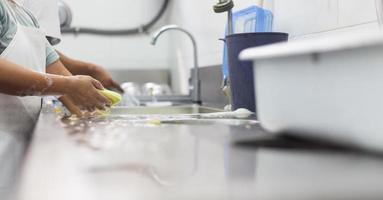 Washing dish on sink photo