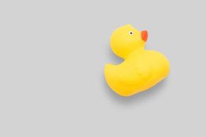 Close up view cute yellow rubber duck isolated on white background. added copy space for text.