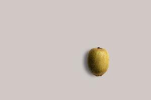 Fresh kiwi fruits on a white background for the menu. Geometric background. Flat lay, copy space, top view. photo