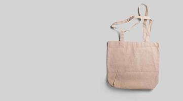 An isolated view of the brown Tote bag on an grey background. photo