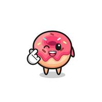 personaje de donut haciendo corazón de dedo coreano vector