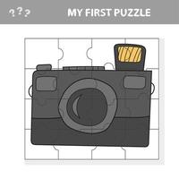 Camera with a lens. Education paper game for preshool children. Jigsaw puzzle vector