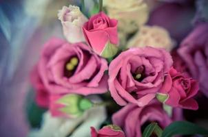 Bouquet with orchids and roses on a beautiful background photo