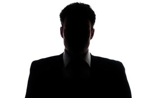 Businessman silhouette wearing a suit photo