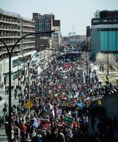 MONTREAL, CANADA APRIL 02 2015 - Panoramic View of the Streets Packed with Protesters photo