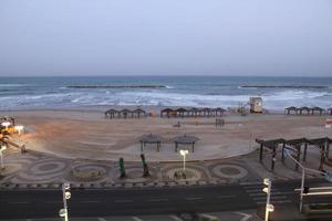 Evening view of Tel Aviv skyline and beach. photo