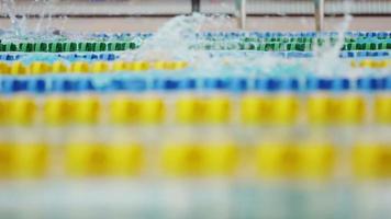 Side view of Swimmers in a Pool in Slow Motion video