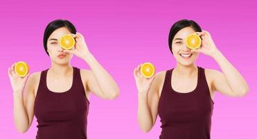 set korean,asian woman holding pieces of oranges isolated on purple background, skin care cosmetic concept, copy space,banner blank photo