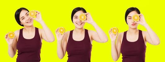 collage happy japanese,asian woman,girl holding pieces of oranges isolated on yellow background, skin care cosmetic concept, copy space,billboard blank photo