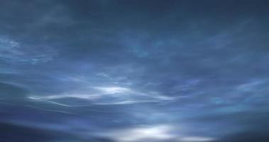 abstract light blue sky and dark clouds shining starry surface aerial texture fog on sky. photo