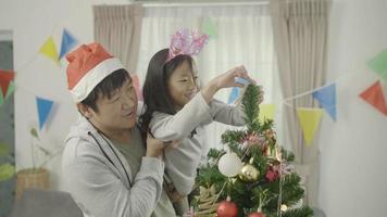 Happy family celebrating Christmas together at home video