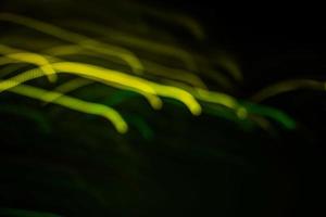 light green trail blur abstract lights at motion exposure time swirl trail effect photo