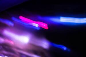 blue and purple light trail blur abstract lights at motion exposure time swirl trail effect photo