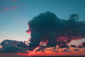 light orange sunset overlay with dark black many clouds on sky orange. photo