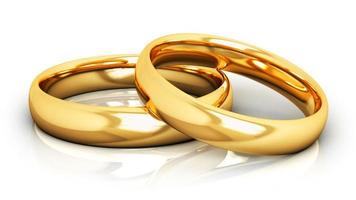 couple golden wedding rings abstract luxury light circles spotlight light effect on white photo