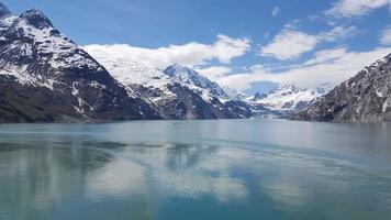 lake with a snowy hill background photo