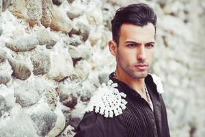 Attractive man, model of fashion, wearing spanish clothes photo